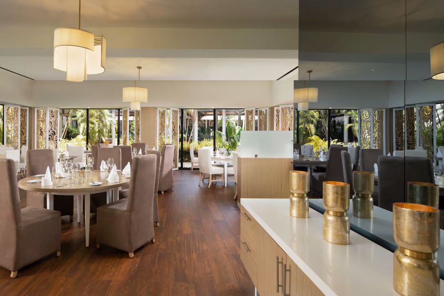 Table and chairs set in restaurant at Melia Caribe Beach Resort