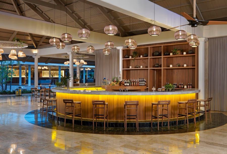 Bar stools by the bar in the restaurant at Melia Caribe Beach Resort