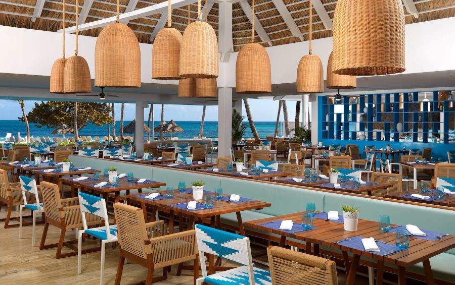 Restaurant under canopy with beach views at Melia Punta Cana Beach Resort