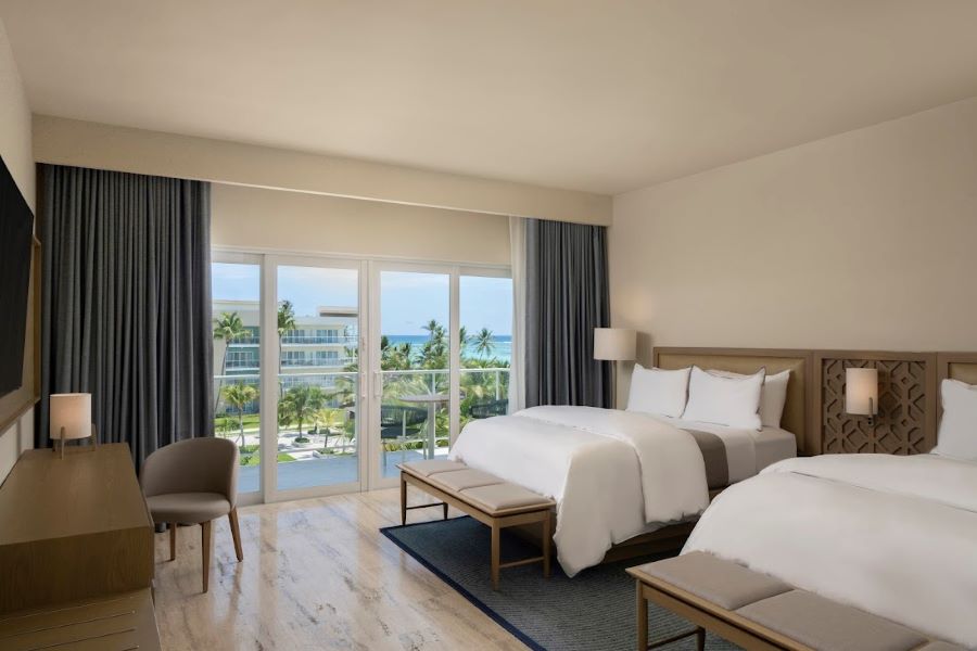 Bedroom with twin beds & balcony at The Westin Puntacana Resort & Club