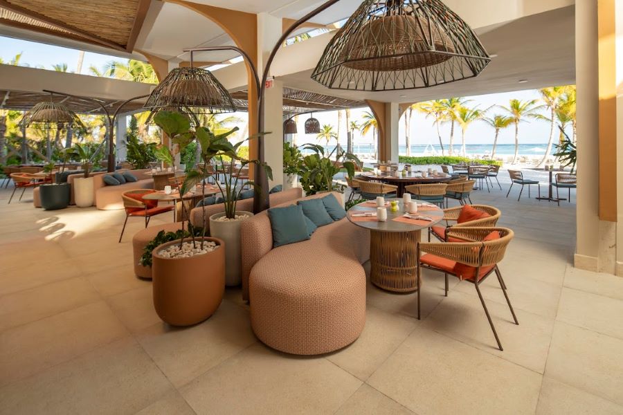 Sofa seats and chairs in restaurant at The Westin Puntacana Resort & Club