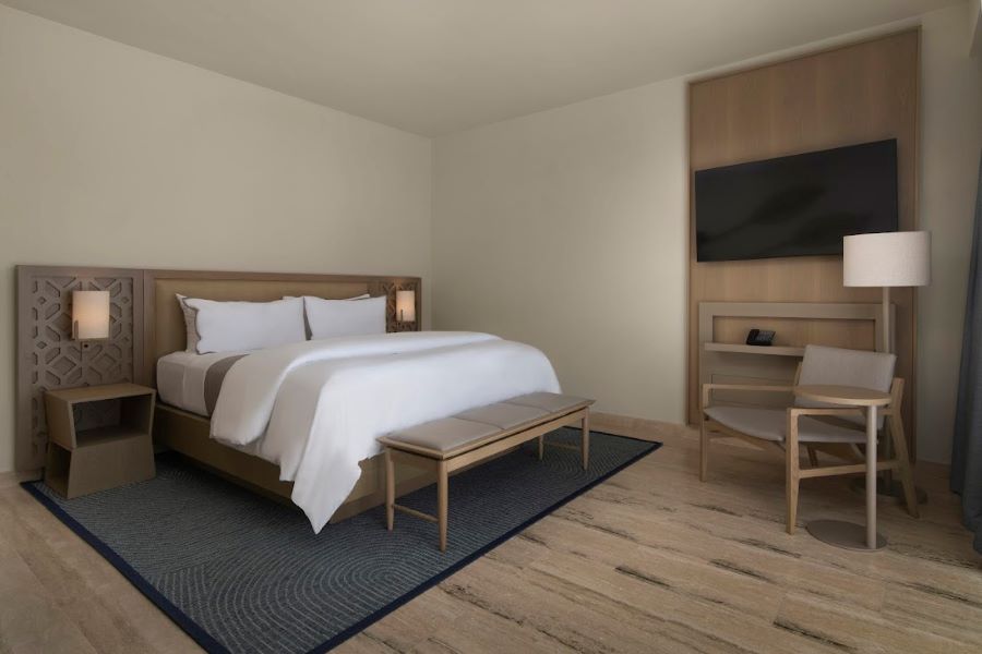 Double bed in guest room at The Westin Puntacana Resort & Club