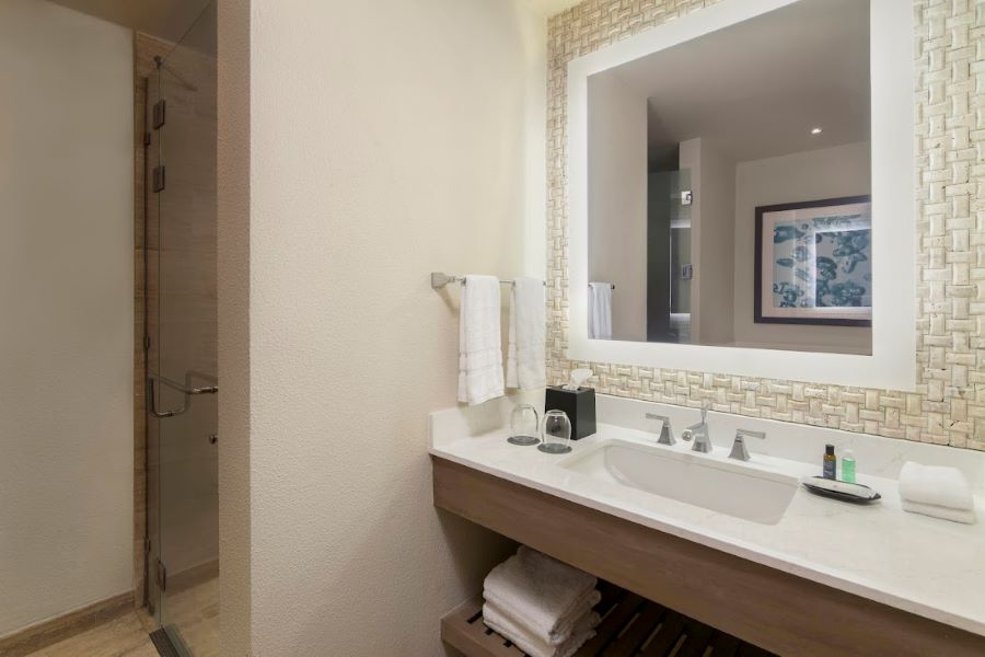 Bathroom with mirror and sink at The Westin Puntacana Resort & Club