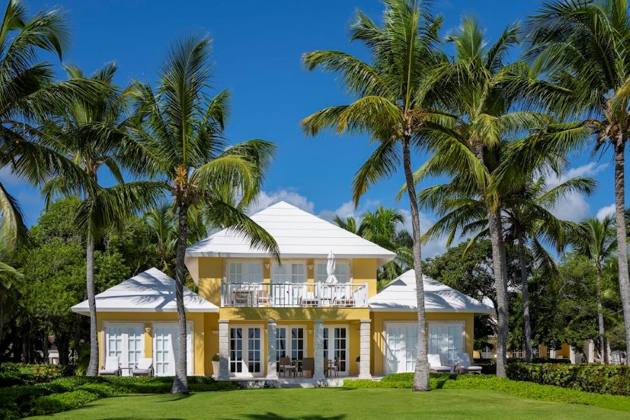 Palm trees and yellow walls at Tortuga Bay Hotel at Puntacana Resort & Club