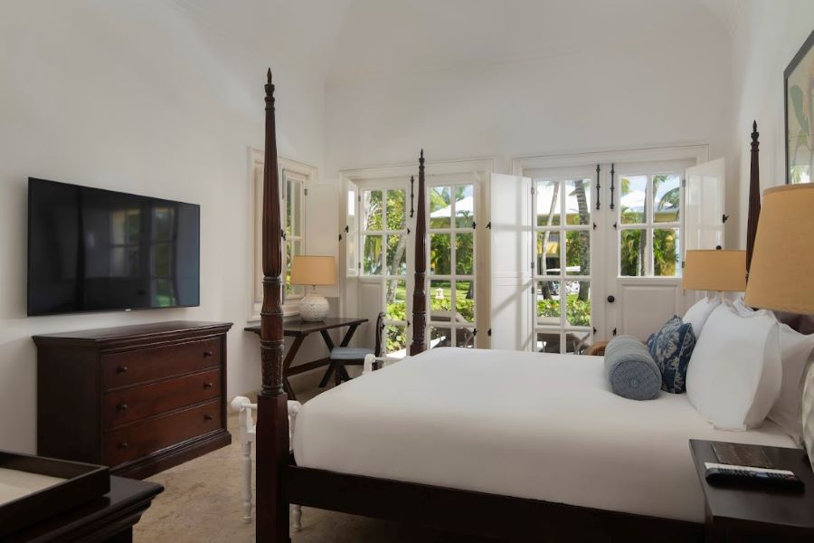 Double bed in bedroom at Tortuga Bay Hotel at Puntacana Resort & Club